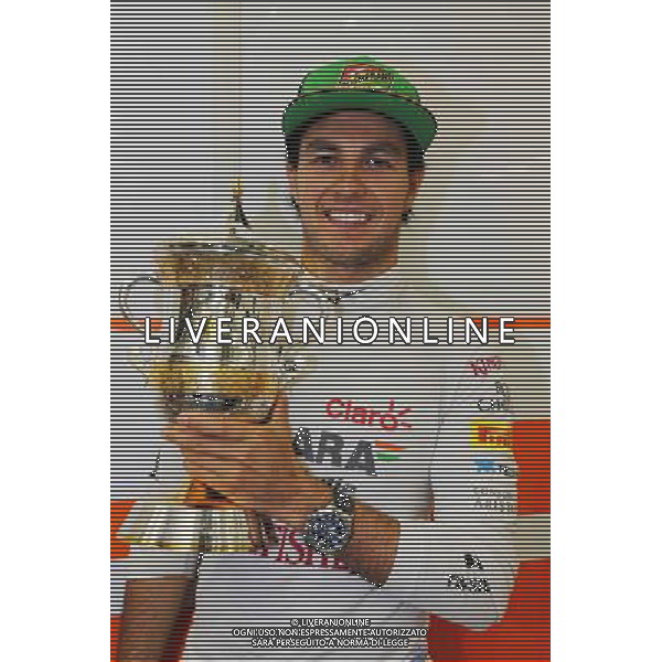 Sergio Perez (MEX) Sahara Force India F1 celebrates his third position. 06.04.2014. Formula 1 World Championship, Rd 3, Bahrain Grand Prix, Sakhir, Bahrain, Race Day. - www.xpbimages.com, EMail: requests@xpbimages.com - copy of publication required for printed pictures. Every used picture is fee-liable. © Copyright: Moy / XPB Images AG ALDO LIVERANI SAS ONLY ITALY