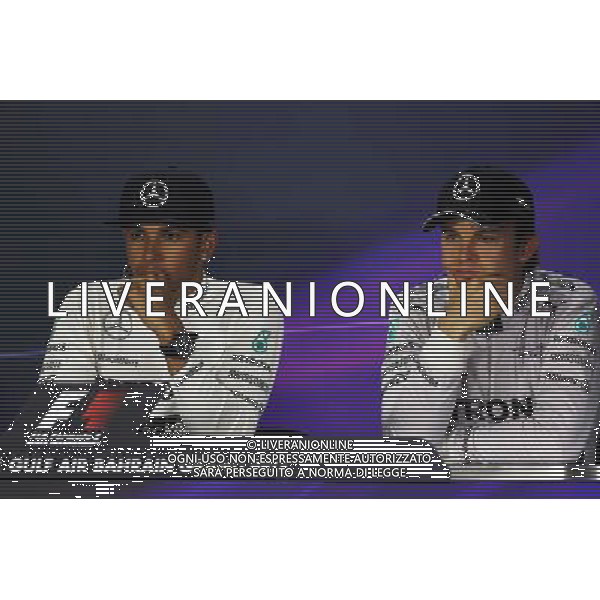 (L to R): Lewis Hamilton (GBR) Mercedes AMG F1 with Nico Rosberg (GER) Mercedes AMG F1 in the FIA Press Conference. 06.04.2014. Formula 1 World Championship, Rd 3, Bahrain Grand Prix, Sakhir, Bahrain, Race Day. - www.xpbimages.com, EMail: requests@xpbimages.com - copy of publication required for printed pictures. Every used picture is fee-liable. © Copyright: Moy / XPB Images AG ALDO LIVERANI SAS ONLY ITALY