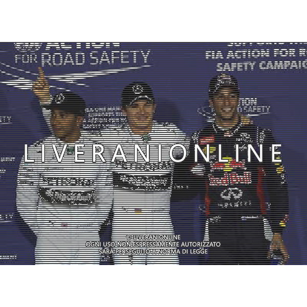(140406) -- MANAMA, April 6, 2014() -- Mercedes\' Nico Rosberg (C), Lewis Hamilton (L) and Red Bull\'s Daniel Ricciardo pose after the qualifying session of the Formula One Bahrain Grand Prix in Manama, Bahrain, on April 5, 2014. Rosberg took the pole position with 1 minute and 33.185 seconds. () ©photoshot/AGENZIA ALDO LIVERANI SAS - ITALY ONLY - EDITORIAL USE ONLY