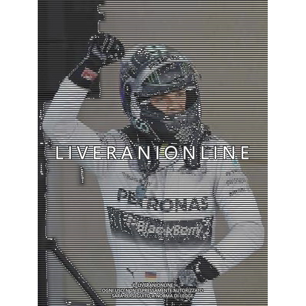 (140406) -- MANAMA, April 6, 2014() -- Mercedes\' Nico Rosberg celebrates after the qualifying session of the Formula One Bahrain Grand Prix in Manama, Bahrain, on April 5, 2014. Rosberg took the pole position with 1 minute and 33.185 seconds. () ©photoshot/AGENZIA ALDO LIVERANI SAS - ITALY ONLY - EDITORIAL USE ONLY