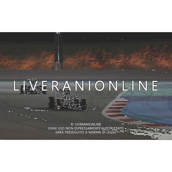 (140407) -- MANAMA, April 7, 2014() -- Mercedes\' Lewis Hamilton (R) and Nico Rosberg compete during the final of Formula 1 Bahrain Grand Prix in Manama, Bahrain, on April 6, 2014. Hamilton won the title with 1 hour 39 minutes and 42.743 seconds. (/Hasan Jamali) ©photoshot/AGENZIA ALDO LIVERANI SAS - ITALY ONLY - EDITORIAL USE ONLY