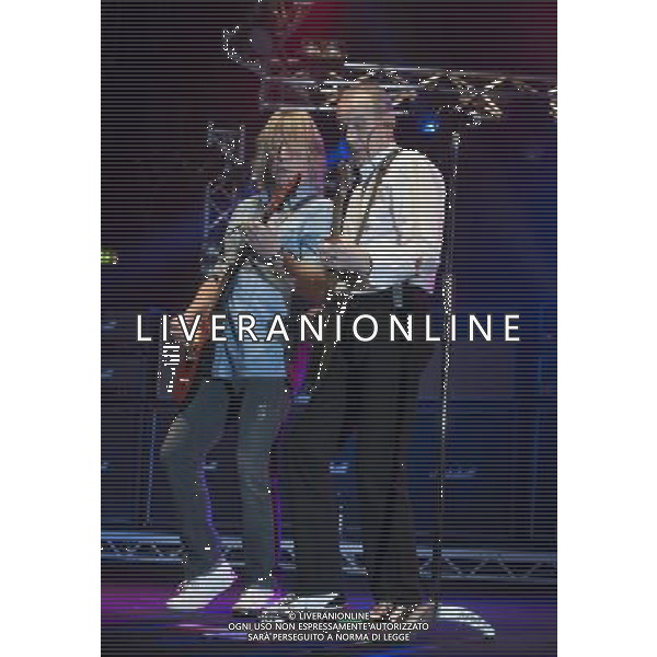 Status Quo performing at Manchester O2 Apollo, England on 6th April 2014. Rick Parfitt â€“ guitar, vocals, Francis Rossi â€“ guitar, vocals. ©PHOTOSHOT/AGENZIA ALDO LIVERANI SAS - ITALY ONLY - EDITORIAL USE ONLY
