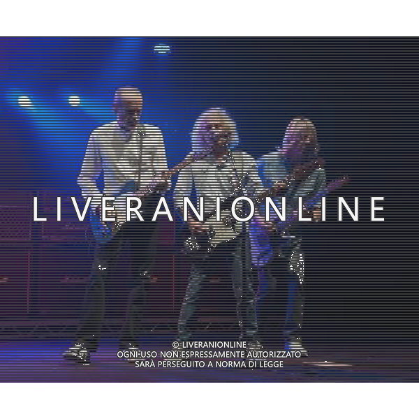 Status Quo performing at Manchester O2 Apollo, England on 6th April 2014. Francis Rossi â€“ guitar, vocals, Alan Lancaster â€“ bass, vocals and Rick Parfitt â€“ guitar, vocals. ©PHOTOSHOT/AGENZIA ALDO LIVERANI SAS - ITALY ONLY - EDITORIAL USE ONLY