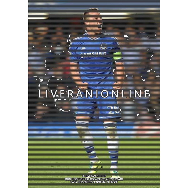 Chelsea\'s John Terry celebrates at the final whistle Photo by Ashley Western/CameraSport Football - UEFA Champions League Quarter Final Second Leg - Chelsea v Paris St Germain - Tuesday 8th April 2014 - Stamford Bridge - London © CameraSport - 43 Linden Ave. Countesthorpe. Leicester. England. LE8 5PG - Tel: +44 (0) 116 277 4147 - admin@camerasport.com - www.camerasport.com AG ALDO LIVERANI SAS ONLY ITALY