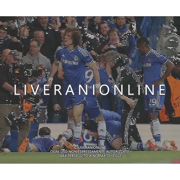Chelsea\'s Demba Ba celebrates scoring his sides second goal whilst Chelsea\'s Manager Jose Mourinho have a word with Chelsea\'s Fernando Torres Photo by Kieran Galvin/CameraSport Football - UEFA Champions League Quarter Final Second Leg - Chelsea v Paris St Germain - Tuesday 8th April 2014 - Stamford Bridge - London © CameraSport - 43 Linden Ave. Countesthorpe. Leicester. England. LE8 5PG - Tel: +44 (0) 116 277 4147 - admin@camerasport.com - www.camerasport.com AG ALDO LIVERANI SAS ONLY ITALY