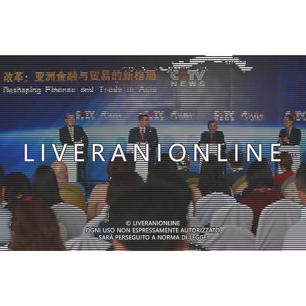 (140408) -- BOAO, April 8, 2014 () -- Honored guests communicate at a TV Debate named \'Reshaping Finance \' Trade in Asia\' during the Boao Forum for Asia (BFA) Annual Conference 2014 in Boao, south China\'s Hainan Province. The forum will be held from April 8 to 11. (/Wang Jingqiang) (yxb) ©PHOTOSHOT/AGENZIA ALDO LIVERANI SAS - ITALY ONLY - EDITORIAL USE ONLY