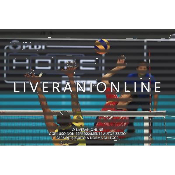(140408) -- PASAY CITY, April 8, 2014 () -- Van Hanh Nguyen (2nd L) of Vietnam spikes the ball during the 2014 Asian Men\'s Club Volleyball Championship against Vietnam in Pasay City, the Philippines on April 8, 2014. Vietnam won 3-2. (/Rouelle Umali) ©PHOTOSHOT/AGENZIA ALDO LIVERANI SAS - ITALY ONLY - EDITORIAL USE ONLY