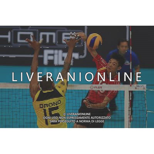 (140408) -- PASAY CITY, April 8, 2014 () -- Van Hanh Nguyen (2nd L) of Vietnam spikes the ball during the 2014 Asian Men\'s Club Volleyball Championship against Vietnam in Pasay City, the Philippines on April 8, 2014. Vietnam won 3-2. (/Rouelle Umali) ©PHOTOSHOT/AGENZIA ALDO LIVERANI SAS - ITALY ONLY - EDITORIAL USE ONLY