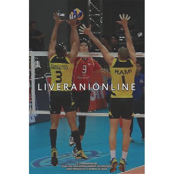 (140408) -- PASAY CITY, April 8, 2014 () -- Huu Ha Nguyen (C) of Vietnam spikes the ball during the 2014 Asian Men\'s Club Volleyball Championship against Vietnam in Pasay City, the Philippines on April 8, 2014. Vietnam won 3-2. (/Rouelle Umali) ©PHOTOSHOT/AGENZIA ALDO LIVERANI SAS - ITALY ONLY - EDITORIAL USE ONLY