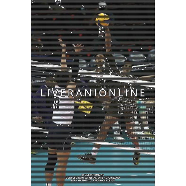 (140409) -- PASAY CITY, April 9, 2014 () -- Ahmed Hassan Alshezawi (R) of Oman spikes the ball during the preliminary round of the 2014 Asian Men\'s Club Volleyball Championship against Hong Kong of China in Pasay City, the Philippines, April 9, 2014. Oman won 3-1. (/Rouelle Umali) AG ALDO LIVERANI SAS ONLY ITALY
