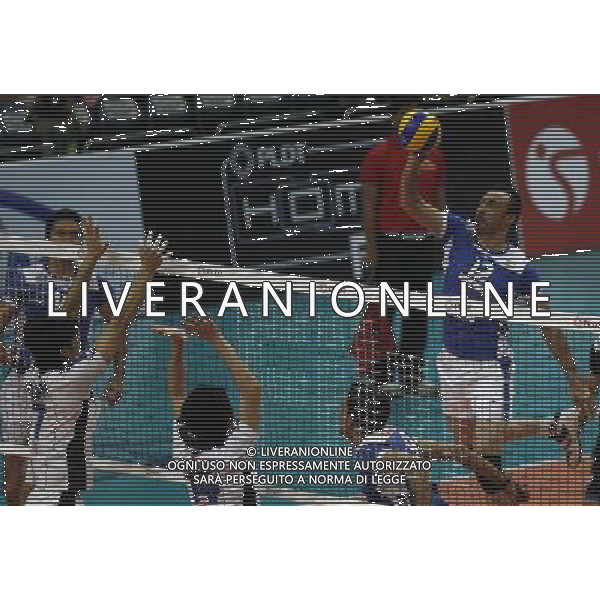 (140409) -- PASAY CITY, April 9, 2014 () -- Farhad Nazari Afshar (R) of Iran spikes the ball during the preliminary round of the 2014 Asian Men\'s Club Volleyball Championship against Japan in Pasay City, the Philippines, April 9, 2014. Iran won 3-1. (/Rouelle Umali) AG ALDO LIVERANI SAS ONLY ITALY