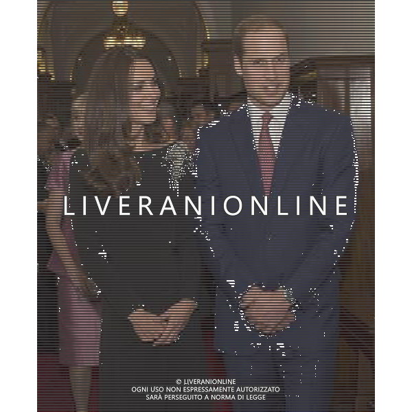 THE DUKE AND DUCHESS OF CAMBRIDGE ATTEND THE STATE RECEPTION AT GOVERNMENT HOUSE WELLINGTON NEW ZEALAND. THE ALSO UNVEILED A PORTRAIT OF HM THE QUEEN BY ARTIST NICK CUTHELL .AND DRANK THE LOYAL TOAST ©photoshot/AGENZIA ALDO LIVERANI SAS - ITALY ONLY - REALI INGLESI: Il Principe William e la moglie Kate Duchessa di Cambridge durante la loro visita in Nuova Zelanda - Aprile 2014