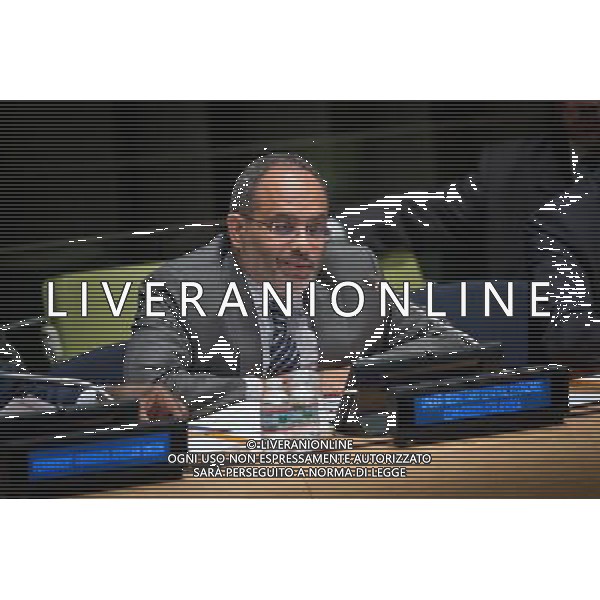 (140411) -- New York, April 11, 2014 () -- Carlos Lopes, United Nations Under-Secretary-General and Executive Secretary of the Economic Commission for Africa, speaks during the launch of the 2014 Economic Report on Africa, at the UN headquarters in New York, on April 11, 2014. Released on Friday by the United Nations and the African Union, the report called on the continent of Africa to refocus its economic development strategies on industrialization, particularly on the means for formulating and implementing effective industrial policy. (/Niu Xiaolei) ©photoshot/AGENZIA ALDO LIVERANI SAS - ITALY ONLY - Relazione economica 2014 Africa, presso la sede delle Nazioni Unite a New York, il 11 aprile 2014.
