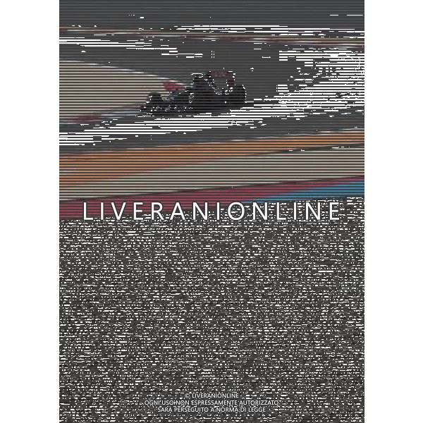 (140410) -- MANAMA, April 10, 2014 () -- Toro Rosso\'s Jean-Eric Vergne drives during the Formula 1 testing at the Sakhir Circuit in Manama, Bahrain, on April 9, 2014. (/Hasan Jamali) ©photoshot/AGENZIA ALDO LIVERANI SAS - ITALY ONLY - EDITORIAL USE ONLY