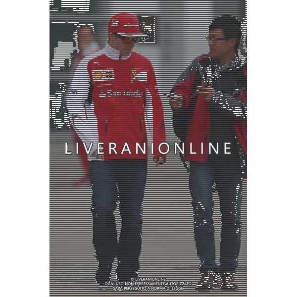 Kimi Raikkonen (FIN) Ferrari signs autographs for the fans. 18.04.2014. Formula 1 World Championship, Rd 4, Chinese Grand Prix, Shanghai, China, Practice Day. - www.xpbimages.com, EMail: requests@xpbimages.com - copy of publication required for printed pictures. Every used picture is fee-liable. Â© Copyright: Batchelor / XPB Images /Ag. Aldo Liverani s.a.s.-Only Italy-Editorial Use Only