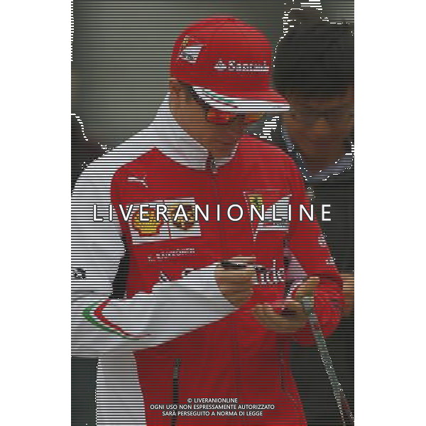 Kimi Raikkonen (FIN) Ferrari signs autographs for the fans. 18.04.2014. Formula 1 World Championship, Rd 4, Chinese Grand Prix, Shanghai, China, Practice Day. - www.xpbimages.com, EMail: requests@xpbimages.com - copy of publication required for printed pictures. Every used picture is fee-liable. Â© Copyright: Batchelor / XPB Images /Ag. Aldo Liverani s.a.s.-Only Italy-Editorial Use Only