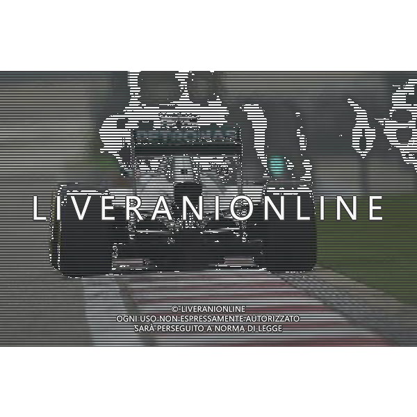 Lewis Hamilton (GBR) Mercedes AMG F1 W05. 18.04.2014. Formula 1 World Championship, Rd 4, Chinese Grand Prix, Shanghai, China, Practice Day. - www.xpbimages.com, EMail: requests@xpbimages.com - copy of publication required for printed pictures. Every used picture is fee-liable. Â© Copyright: Price / XPB Images /Ag. Aldo Liverani s.a.s.-Only Italy-Editorial Use Only