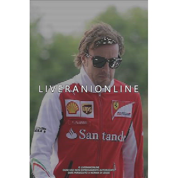 Fernando Alonso (ESP) Ferrari. 18.04.2014. Formula 1 World Championship, Rd 4, Chinese Grand Prix, Shanghai, China, Practice Day. - www.xpbimages.com, EMail: requests@xpbimages.com - copy of publication required for printed pictures. Every used picture is fee-liable. Â© Copyright: Price / XPB Images /Ag. Aldo Liverani s.a.s.-Only Italy-Editorial Use Only