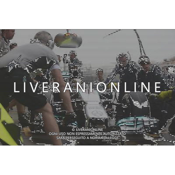 Lewis Hamilton (GBR) Mercedes AMG F1 W05 practices a pit stop. 19.04.2014. Formula 1 World Championship, Rd 4, Chinese Grand Prix, Shanghai, China, Qualifying Day. - www.xpbimages.com, EMail: requests@xpbimages.com - copy of publication required for printed pictures. Every used picture is fee-liable. © Copyright: Price / XPB Images /Ag. Aldo Liverani s.a.s.-Only Italy-Editorial Use Only