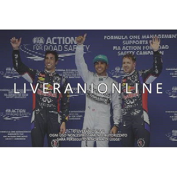 Qualifying top three in parc ferme (L to R): Daniel Ricciardo (AUS) Red Bull Racing, second; Lewis Hamilton (GBR) Mercedes AMG F1, pole position; Sebastian Vettel (GER) Red Bull Racing, third. 19.04.2014. Formula 1 World Championship, Rd 4, Chinese Grand Prix, Shanghai, China, Qualifying Day. - www.xpbimages.com, EMail: requests@xpbimages.com - copy of publication required for printed pictures. Every used picture is fee-liable. © Copyright: Price / XPB Images /Ag. Aldo Liverani s.a.s.-Only Italy-Editorial Use Only