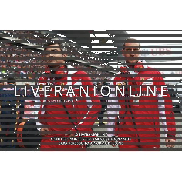 (L to R): Marco Mattiacci (ITA) Ferrari Team Principal with Renato Bisignani (ITA) Ferrari Head of Communications. 20.04.2014. Formula 1 World Championship, Rd 4, Chinese Grand Prix, Shanghai, China, Race Day. - www.xpbimages.com, EMail: requests@xpbimages.com - copy of publication required for printed pictures. Every used picture is fee-liable. © Copyright: Batchelor / XPB Images /Ag. Aldo Liverani s.a.s.-Only Italy-Editorial Use Only