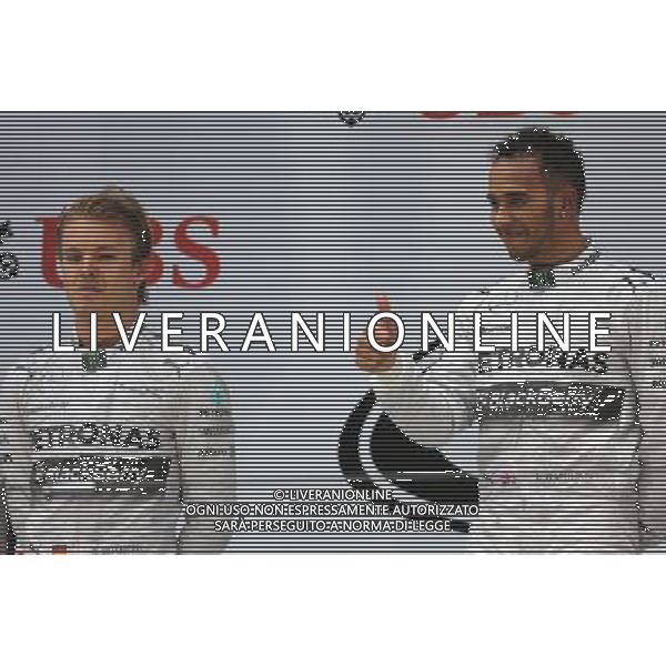 Nico Rosberg (GER), Mercedes AMG F1 Team and Lewis Hamilton (GBR), Mercedes AMG F1 Team 20.04.2014. Formula 1 World Championship, Rd 4, Chinese Grand Prix, Shanghai, China, Race Day. - www.xpbimages.com, EMail: requests@xpbimages.com - copy of publication required for printed pictures. Every used picture is fee-liable. © Copyright: Charniaux / XPB Images /Ag. Aldo Liverani s.a.s.-Only Italy-Editorial Use Only