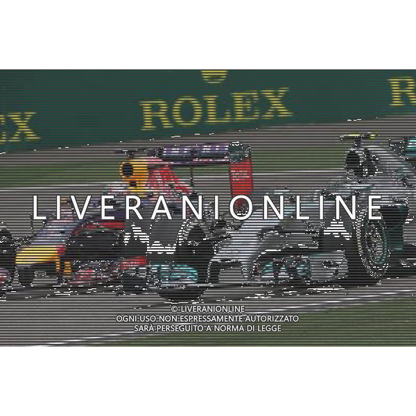Nico Rosberg (GER), Mercedes AMG F1 Team and Sebastian Vettel (GER), Red Bull Racing 20.04.2014. Formula 1 World Championship, Rd 4, Chinese Grand Prix, Shanghai, China, Race Day. - www.xpbimages.com, EMail: requests@xpbimages.com - copy of publication required for printed pictures. Every used picture is fee-liable. © Copyright: Charniaux / XPB Images /Ag. Aldo Liverani s.a.s.-Only Italy-Editorial Use Only
