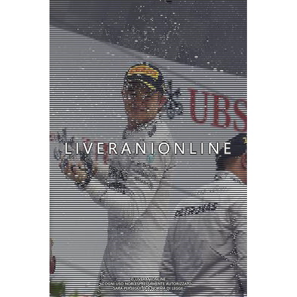 Nico Rosberg (GER) Mercedes AMG F1 W05 celebrates his second position on the podium. 20.04.2014. Formula 1 World Championship, Rd 4, Chinese Grand Prix, Shanghai, China, Race Day. - www.xpbimages.com, EMail: requests@xpbimages.com - copy of publication required for printed pictures. Every used picture is fee-liable. © Copyright: Price / XPB Images /Ag. Aldo Liverani s.a.s.-Only Italy-Editorial Use Only