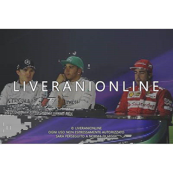 The FIA Press Conference (L to R): Nico Rosberg (GER) Mercedes AMG F1, second; Lewis Hamilton (GBR) Mercedes AMG F1, race winner; Fernando Alonso (ESP) Ferrari, third. 20.04.2014. Formula 1 World Championship, Rd 4, Chinese Grand Prix, Shanghai, China, Race Day. - www.xpbimages.com, EMail: requests@xpbimages.com - copy of publication required for printed pictures. Every used picture is fee-liable. © Copyright: Price / XPB Images /Ag. Aldo Liverani s.a.s.-Only Italy-Editorial Use Only