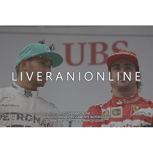 The podium (L to R): Race winner Lewis Hamilton (GBR) Mercedes AMG F1 with Fernando Alonso (ESP) Ferrari. 20.04.2014. Formula 1 World Championship, Rd 4, Chinese Grand Prix, Shanghai, China, Race Day. - www.xpbimages.com, EMail: requests@xpbimages.com - copy of publication required for printed pictures. Every used picture is fee-liable. © Copyright: Price / XPB Images /Ag. Aldo Liverani s.a.s.-Only Italy-Editorial Use Only