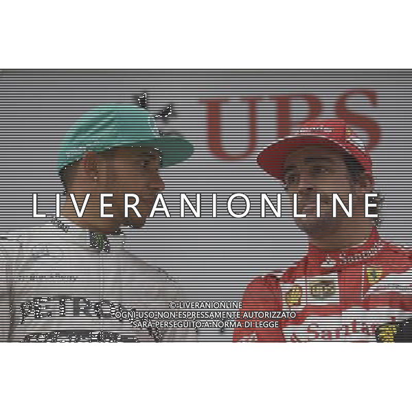 The podium (L to R): Race winner Lewis Hamilton (GBR) Mercedes AMG F1 with Fernando Alonso (ESP) Ferrari. 20.04.2014. Formula 1 World Championship, Rd 4, Chinese Grand Prix, Shanghai, China, Race Day. - www.xpbimages.com, EMail: requests@xpbimages.com - copy of publication required for printed pictures. Every used picture is fee-liable. © Copyright: Price / XPB Images /Ag. Aldo Liverani s.a.s.-Only Italy-Editorial Use Only