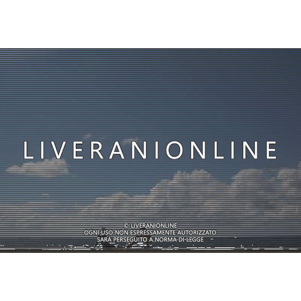 (140422) -- HAVANA, April 22, 2014 () -- Cuban citizens rest at a pier, in Havana, capital of Cuba, on April 21, 2014. (/David de la Paz) ©photoshot/AGENZIA ALDO LIVERANI SAS - ITALY ONLY - Cittadini cubani nelle vie della citta\' a L\'Avana, capitale di Cuba, il 21 aprile 2014