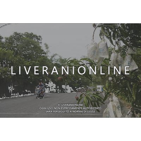 (140422) -- PINGTUNG, April 22, 2014 () -- Photo taken on April 21, 2014 shows mango trees in Liouciou Township in Pingtung County, southeast China\'s Taiwan. Liouciou township, which locates 8-9 nautical miles away from the Taiwan Island, has an area of 6.8 square meters. (/Huang Xiaoyong) (lfj) ©photoshot/AGENZIA ALDO LIVERANI SAS - ITALY ONLY - Vedute della citta\' portuale di Liouciou, a sud est della Cina a 8-9 miglia nautiche dall\'isola di Taiwan, ha una superficie di 6,8 metri quadrati 22 aprile 2014