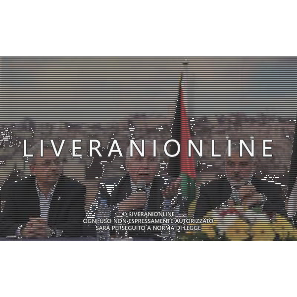 (140424) -- GAZA, April 24, 2014 () -- Palestinian legislator Mustafa Barghouti (L), Palestinian Fatah delegation chief Azzam al-Ahmed (C) and Prime Minister of Hamas authorities in the Gaza Strip Ismail Haniya, attend a press conference in Gaza on April 23, 2014. Palestinian President Mahmoud Abbas\' Fatah party and the Hamas movement on Wednesday announced a reconciliation agreement, declaring an end to their internal split. (/Wissam Nassar) ©PHOTOHSOT/AGENZIA ALDO LIVERANI SAS - ITALY ONLY - EDITORIAL USE ONLY - Celebrazione per l\'accordo di riconciliazione recentemente stipulato tra l\'Organizzazione Liberazione della Palestina (OLP) e Hamas, a Gaza City, il 23 aprile 2014.