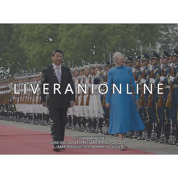 (140424) -- BEIJING, April 24, 2014 () -- Chinese President Xi Jinping (L) and Danish Queen Margrethe II (R) review the guard of honor at the welcoming ceremony before their talks in Beijing, capital of China, April 24, 2014.(/Xie Huanchi) (zkr) AG ALDOL IVERANI SAS ONLY ITALY