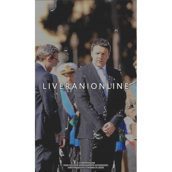 (140425) -- ROME, April 25, 2014 () -- Italian Prime Minister Matteo Renzi (R) attends the wreath-laying ceremony commemorating the 69th Liberation Day at the Altar of the Fatherland in Rome, capital of Italy, on April 25, 2014. (/Xu Nizhi) ©photoshot/AGENZIA ALDO LIVERANI SAS - ITALY ONLY - Cerimonia di deposizione della corona per commemorare la Festa della Liberazione presso l\'Altare della Patria a Roma, capitale della Italia, il 25 aprile 2014. 
