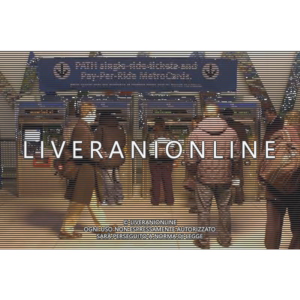 Commuters on the PATH trains at the World Trade Center station purchase commutation cards at machines on February 21, 2006. A report released by the Citizens Budget Commission recommends that the Port Authority of New York and New Jersey turn over operations of the money losing PATH system to New Jersey Transit. The rail system is the only transit system in the country not supported by taxpayer funds. It gets its operating expenses from its passengers and money the Port Authority earns from its control of the airports and shipping terminals. These finances are considered unsustainable. Originally the Hudson and Manhattan Railroad (Hudson Tubes), the Port Authority Trans-Hudson (PATH) serves Manhattan and points in NJ as far as Newark. Revenue service began in 1908. The Port Authority took over operation in 1962 in a real estate deal enabling them to build the World Trade Center over the Lower Manhattan loop around. ( Richard B. Levine) Photo via Newscom - Vedute della citta\' di New York - Vita quotidiana