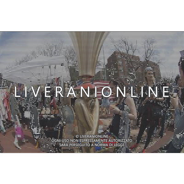 Shoppers at the original Brooklyn Flea in the neighborhood of Clinton Hill on Saturday, April 12, 2014. The flea market, which hosts over 100 booths by Brooklyn vendors offering handmade or used merchandise opens up in the athletic field of Bishop Loughlin High School on Saturdays. Shoppers come from all over the city for the bargains and one-of-a-kind local merchandise that is offered for sale. The creators have since branched out with other locations in Brooklyn as well as their trendy Smorgasburg, a Brooklyn Flea for foodies. (Œ Frances M. Roberts) ©PHOTOSHOT/AGENZIA ALDO LIVERANI SAS - ITALY ONLY - EDITORIAL USE ONLY - Vedute della citta\' di New York - Vita quotidiana