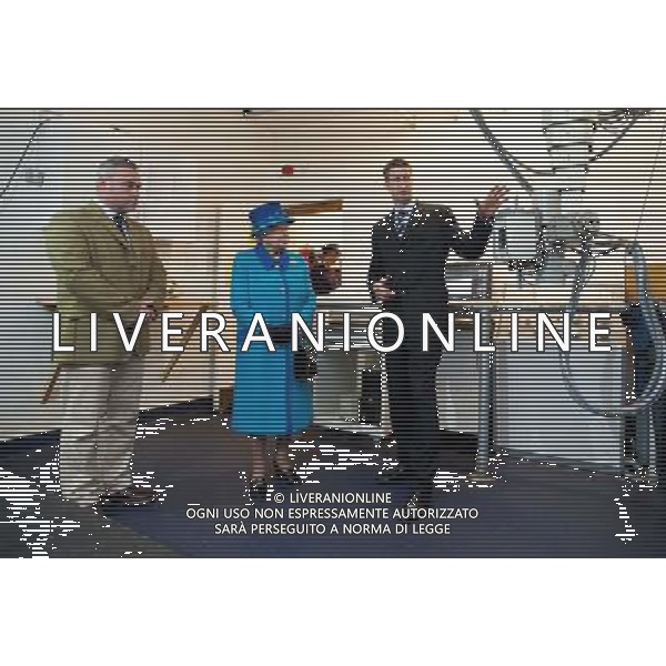 NARBETH, WALES - APRIL 29: Queen Elizabeth II looks at an equine x-ray machine during an official visit to Cotts Farm Equine Hospital, Narbeth on April 29, 2014 in Narbeth, Wales. The Cotts Equine Hospital is a purpose-built facility offering veterinary equine care. AG ALDO LIVERANI SAS ONLY ITALY
