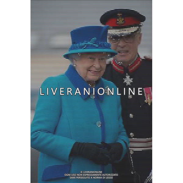 NARBETH, WALES - APRIL 29: Queen Elizabeth II smiles during an official visit to Cotts Farm Equine Hospital, Narbeth on April 29, 2014 in Narbeth, Wales. The Cotts Equine Hospital is a purpose-built facility offering veterinary equine care. AG ALDO LIVERANI SAS ONLY ITALY
