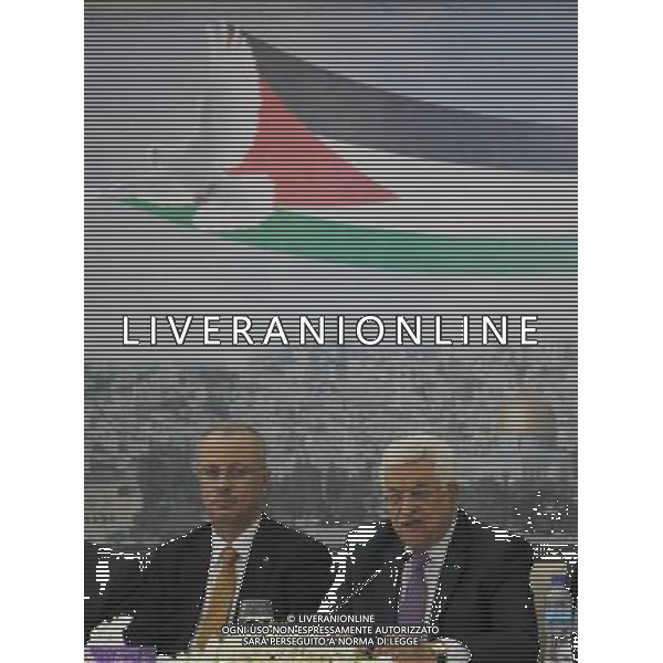 (140429 ) -- RAMALLAH, April 29 , 2014 () -- Palestinian President Mahmoud Abbas (R) speaks during a foundation meeting of a Jerusalem Fund with Palestinian businessmen at his office in the West Bank city of Ramallah, April 29, 2014. Palestinian President Mahmoud Abbas said Tuesday that the next few days will witness concrete steps to implement the reconciliation deal his Fatah party signed with Hamas movement recently. \'We will start to implement we have agreed upon during the upcoming few days,\' Abbas said during the meeting. (/Fadi Arouri) AG ALDO LIVERANI SAS ONLY ITALY