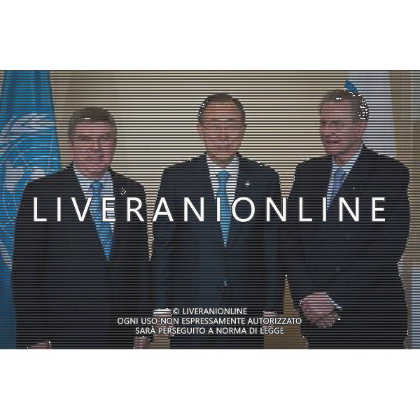 (140429) -- New York, April 29, 2014 () -- United Nations Secretary-General Ban Ki-moon (C), International Olympic Committee chief Thomas Bach (L) and former chief Jacques Rogge pose for a picture at the UN headquarters in New York, on April 28, 2014. UN Secretary-General Ban Ki-moon and International Olympic Committee chief Thomas Bach signed an agreement on Monday aimed at strengthening collaboration between the two organizations to promote the role of sport in development and peace. The IOC, which was granted UN Observer Status in 2009, has long enjoyed strong ties with individual UN agencies, working with them globally on a number of initiatives that use sport as a tool for development and peace. (/Niu Xiaolei) AG ALDOL IVERANI SAS ONLY ITALY