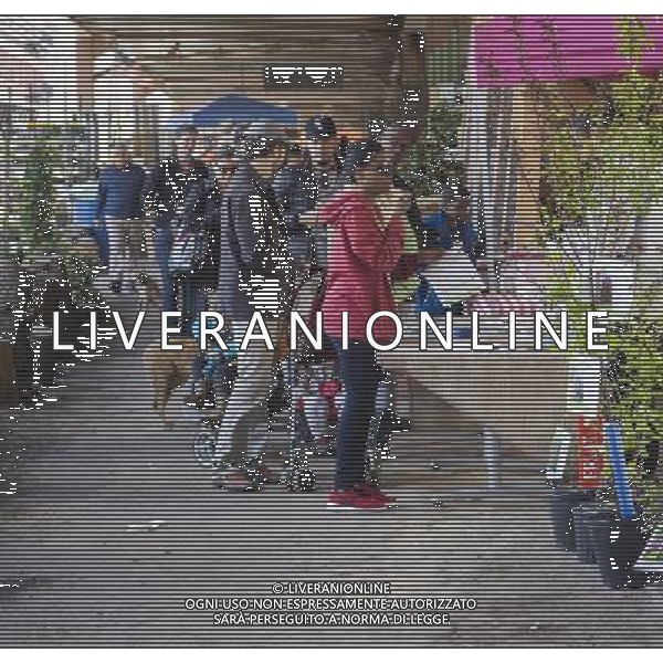 New Yorkers line up at the Urban Garden Center in East Harlem in New York on Sunday, April 27, 2014 at one of the New York Restoration Project\'s tree giveaways.The giveaway is part of the MillionTreesNYC initiative started in 2007 as part of the city\'s long term sustainability program. The goal is to increase the \'urban forest\', comprised of street, park, public and private trees, to the betterment of the quality of life for New Yorkers. ©photoshot/AGENZIA ALDO LIVERANI SAS - ITALY ONLY - Vedute della citta\' di New York - Vita quotidiana