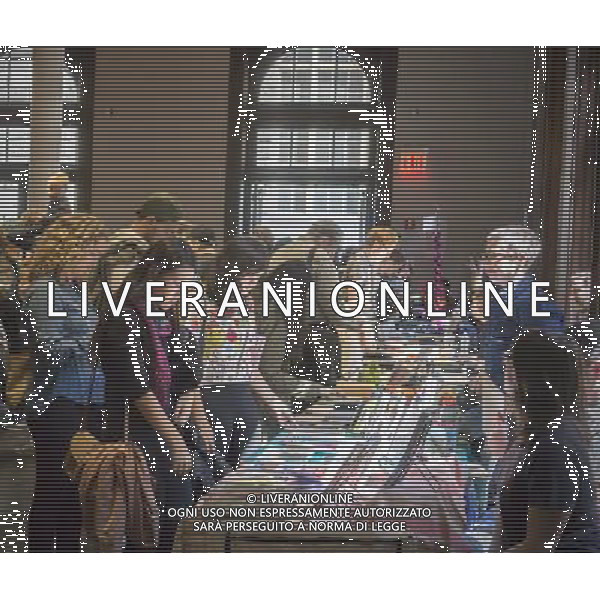 Visitors browse the exhibitors\' booths at the Brooklyn Zine Fest in New York on Saturday, April 26, 2014. The two-day festival offers a showcase for artists of self-published zines showing off their writing, photography and creative prowess. ©photoshot/AGENZIA ALDO LIVERANI SAS - ITALY ONLY - Vedute della citta\' di New York - Vita quotidiana