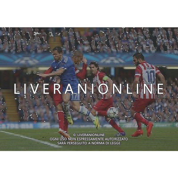 Chelsea\'s Eden Hazarddespite the attentions of Atletico Madrid\'s Mario Suarez Photo by Kieran Galvin/CameraSport Football - UEFA Champions League Semi-Final Second Leg - Chelsea v Atletico Madrid - Wednesday 30th April 2014 - Stamford Bridge - London © CameraSport - 43 Linden Ave. Countesthorpe. Leicester. England. LE8 5PG - Tel: +44 (0) 116 277 4147 - admin@camerasport.com - www.camerasport.com AG ALDO LIVERANI SAS ONLY ITALY
