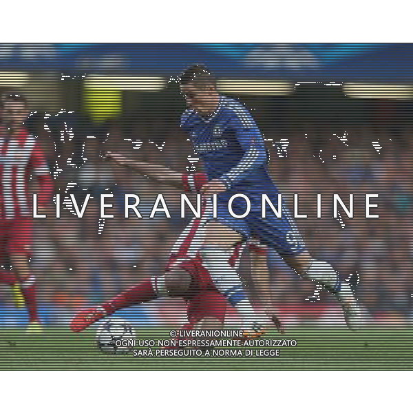 Chelsea\'s Fernando Torres despite the attentions of Atletico Madrid\'s Arda Turan Photo by Kieran Galvin/CameraSport Football - UEFA Champions League Semi-Final Second Leg - Chelsea v Atletico Madrid - Wednesday 30th April 2014 - Stamford Bridge - London © CameraSport - 43 Linden Ave. Countesthorpe. Leicester. England. LE8 5PG - Tel: +44 (0) 116 277 4147 - admin@camerasport.com - www.camerasport.com AG ALDO LIVERANI SAS ONLY ITALY