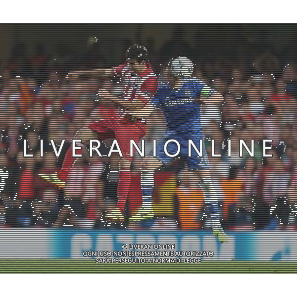 Chelsea\'s John Terry despite the attentions of Atletico Madrid\'s Diego Costa Photo by Kieran Galvin/CameraSport Football - UEFA Champions League Semi-Final Second Leg - Chelsea v Atletico Madrid - Wednesday 30th April 2014 - Stamford Bridge - London © CameraSport - 43 Linden Ave. Countesthorpe. Leicester. England. LE8 5PG - Tel: +44 (0) 116 277 4147 - admin@camerasport.com - www.camerasport.com AG ALDO LIVERANI SAS ONLY ITALY