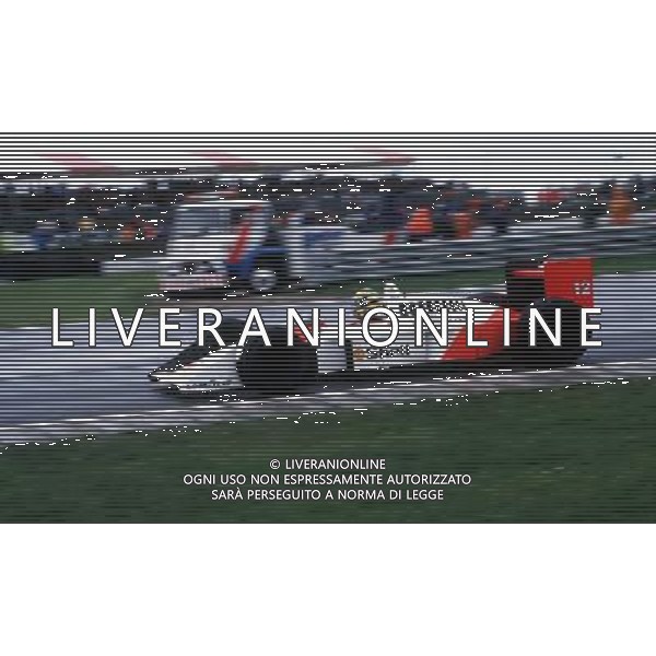 AYRTON SENNA MARLBOROUGH MCLAREN HONDA BRITISH GRAND PRIX SILVERSTONE12/07/88 PHOTO FOTOSPORTS INTERNATIONAL ©PHOTOSHOT/AGENZIA ALDO LIVERANI SAS - ITALY ONLY - EDITORIAL USE ONLY