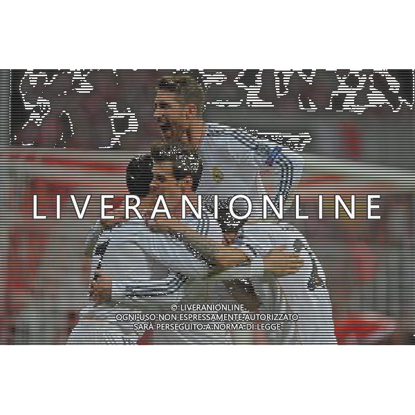 29.04.2014, Allianz Arena, Muenchen, GER, UEFA CL, FC Bayern Muenchen vs Real Madrid, Halbfinale, Ruckspiel, im Bild Freude bei Cristiano Ronaldo (Real Madrid) nach seinem Tor zum 0:3, ganz links, daneben Gareth Bale (Real Madrid), Sergios Ramos (Real Madrid) und Angel di Maria (Real Madrid) // during the UEFA Champions League Round of 4, 2nd Leg Match between FC Bayern Munich vs Real Madrid at the Allianz Arena in Muenchen, Germany on 2014/04/30. EXPA Pictures © 2014, PhotoCredit: EXPA/ Eibner-Pressefoto/ Stuetzle *****ATTENTION - OUT of GER***** ©PHOTOSHOT/AGENZIA ALDO LIVERANI SAS - ITALY ONLY - EDITORIAL USE ONLY - BAYERN MONACO - REAL MADRID SEMIFINALE DI RITORNO CHAMPIONS LEAGUE