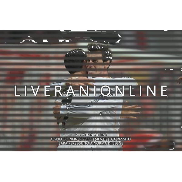 29.04.2014, Allianz Arena, Muenchen, GER, UEFA CL, FC Bayern Muenchen vs Real Madrid, Halbfinale, Ruckspiel, im Bild vl. Cristiano Ronaldo (Real Madrid) und Gareth Bale (Real Madrid) bejubeln das 0:3 durch Cristiano Ronaldo (Real Madrid) // during the UEFA Champions League Round of 4, 2nd Leg Match between FC Bayern Munich vs Real Madrid at the Allianz Arena in Muenchen, Germany on 2014/04/30. EXPA Pictures © 2014, PhotoCredit: EXPA/ Eibner-Pressefoto/ Stuetzle *****ATTENTION - OUT of GER***** ©PHOTOSHOT/AGENZIA ALDO LIVERANI SAS - ITALY ONLY - EDITORIAL USE ONLY - BAYERN MONACO - REAL MADRID SEMIFINALE DI RITORNO CHAMPIONS LEAGUE